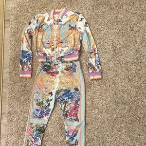 New matching jacket, pants size small animal print